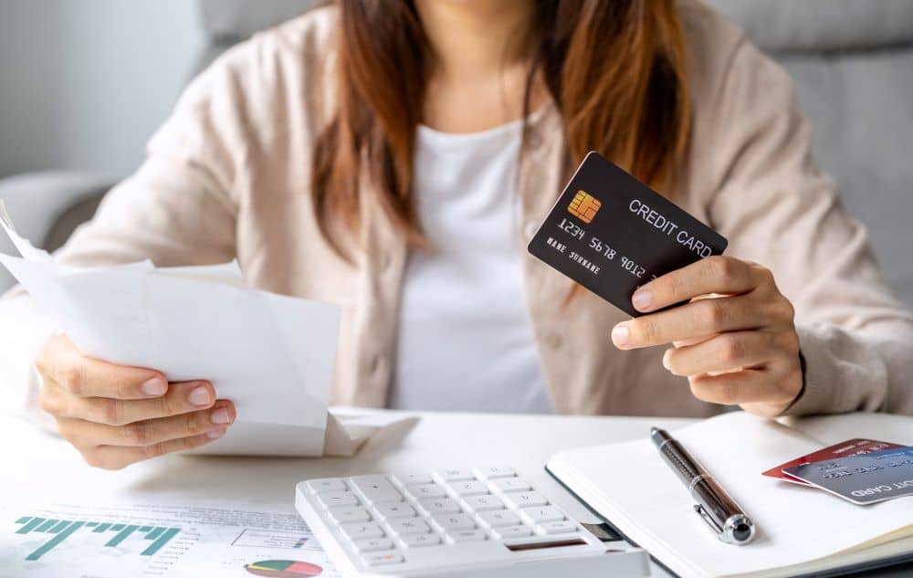 A woman using credit card